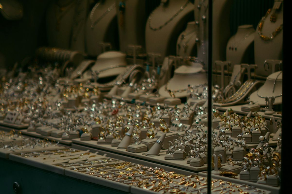 Gold vs platinum jewellery display in store window in Australia .