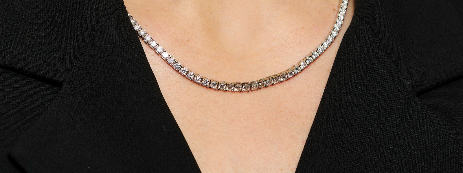Model wearing a Prism & Pearl moissanite tennis necklace