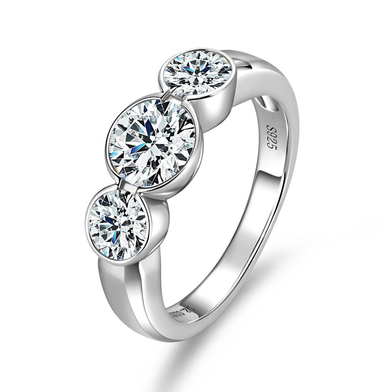 Romane three stone bezel moissanite ring in sterling silver