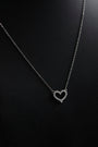 Close-up of the Étoile Pavé Heart pendant and chain