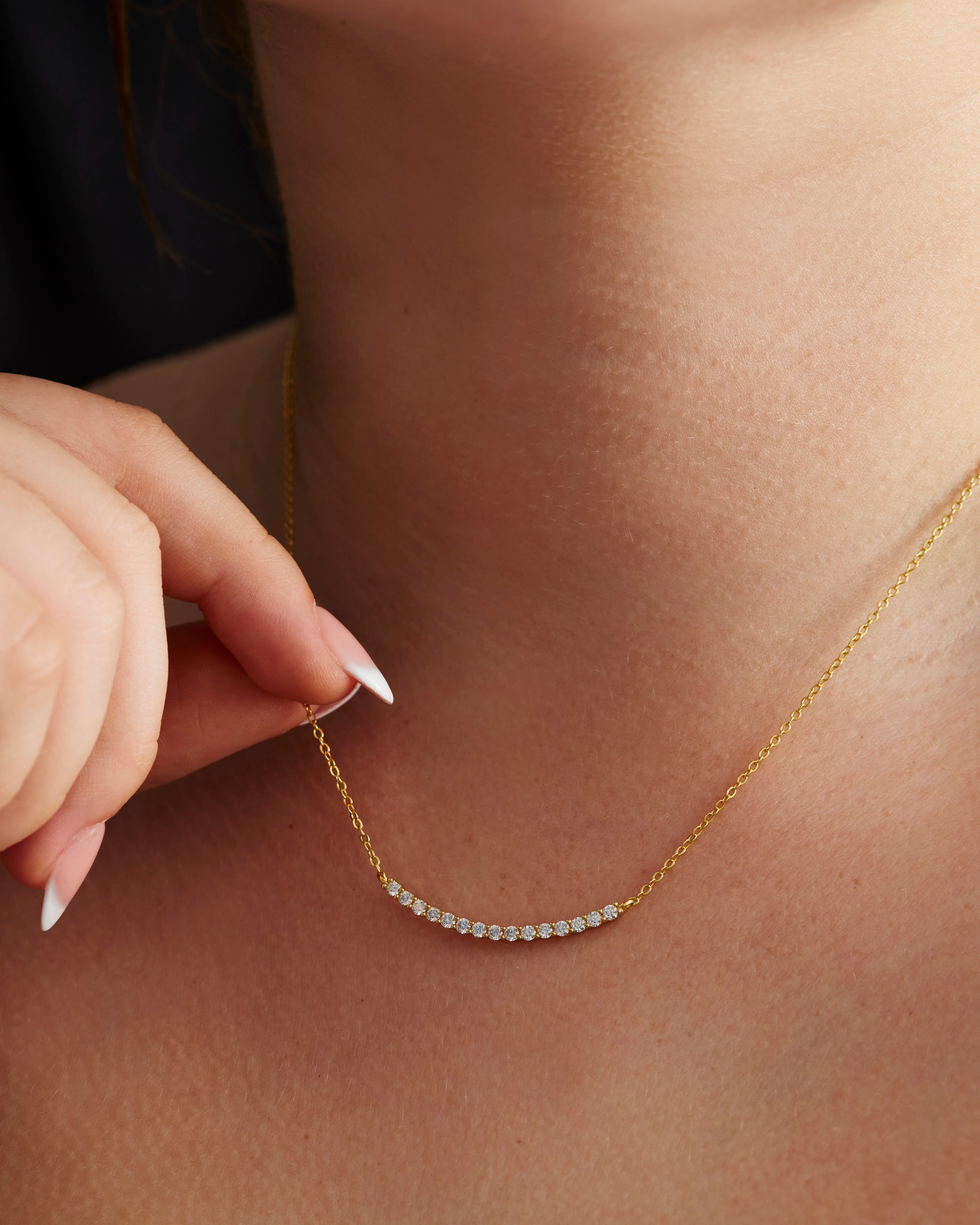 Fine moissanite necklace worn