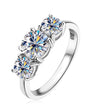 Yvonne shared prong moissanite trilogy ring in sterling silver