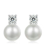 Pearl earrings with 0.1CT moissanite on a white background