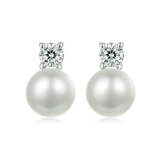 Pearl earrings with 0.1CT moissanite on a white background