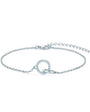 Silver bracelet with interlocking circles with pavé moissantes on a white background