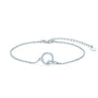 Silver bracelet with interlocking circles with pavé moissantes on a white background