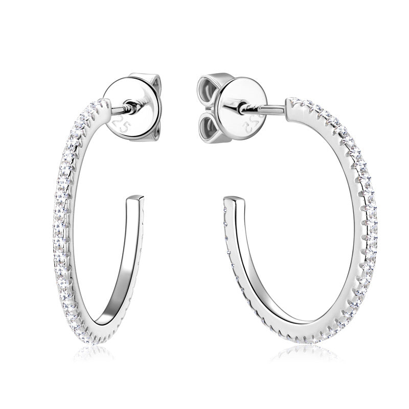 Silver hoop earrings with clear moissanite gemstones 0.2ct*2pcs on a white background