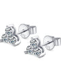 Pair of silver stud earrings with a trio of moissanite gemstones on a white background