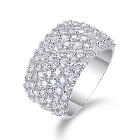 Wide seven row pavé moissanite stacker ring in sterling silver.