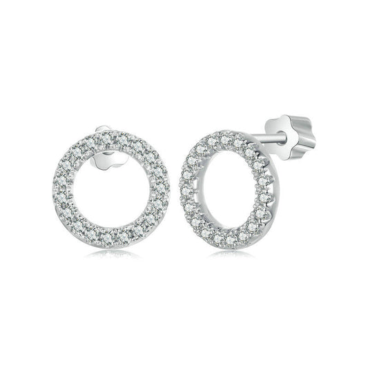 Pair of silver stud earrings in a circle of pavé moissanites on a white background