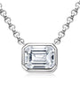 Emerald cut moissanite in a sleek bezel pendant