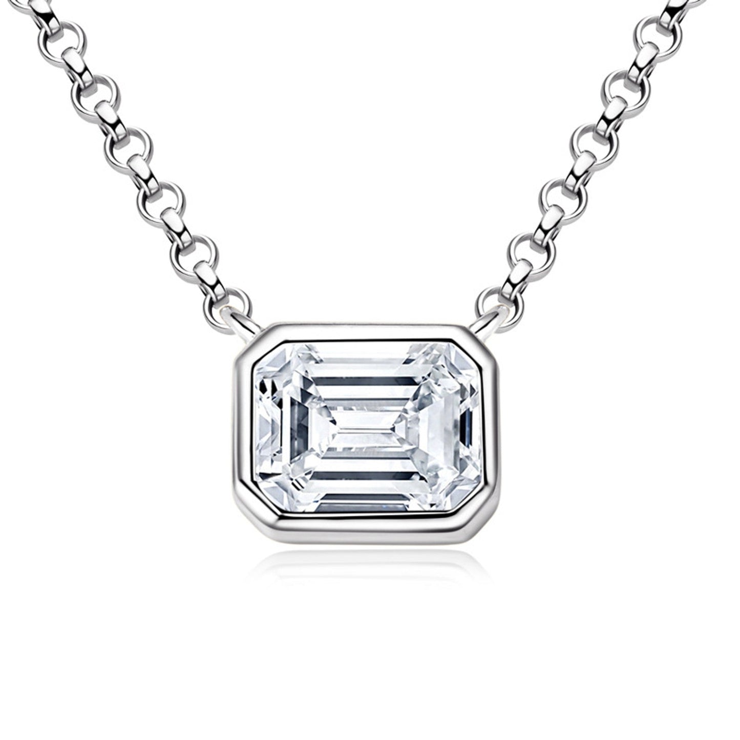 Emerald cut moissanite in a sleek bezel pendant