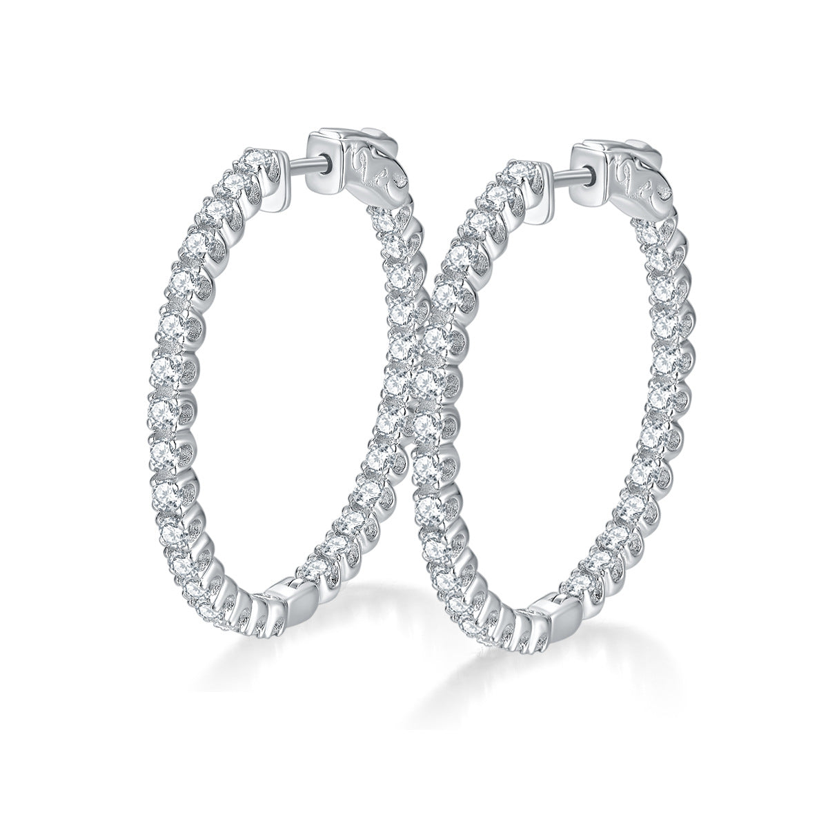 Pair of silver hoop earrings with 1.56ct of moissanite gemstones on a white background
