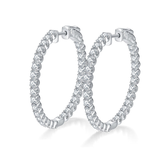 Pair of silver hoop earrings with 1.56ct of moissanite gemstones on a white background
