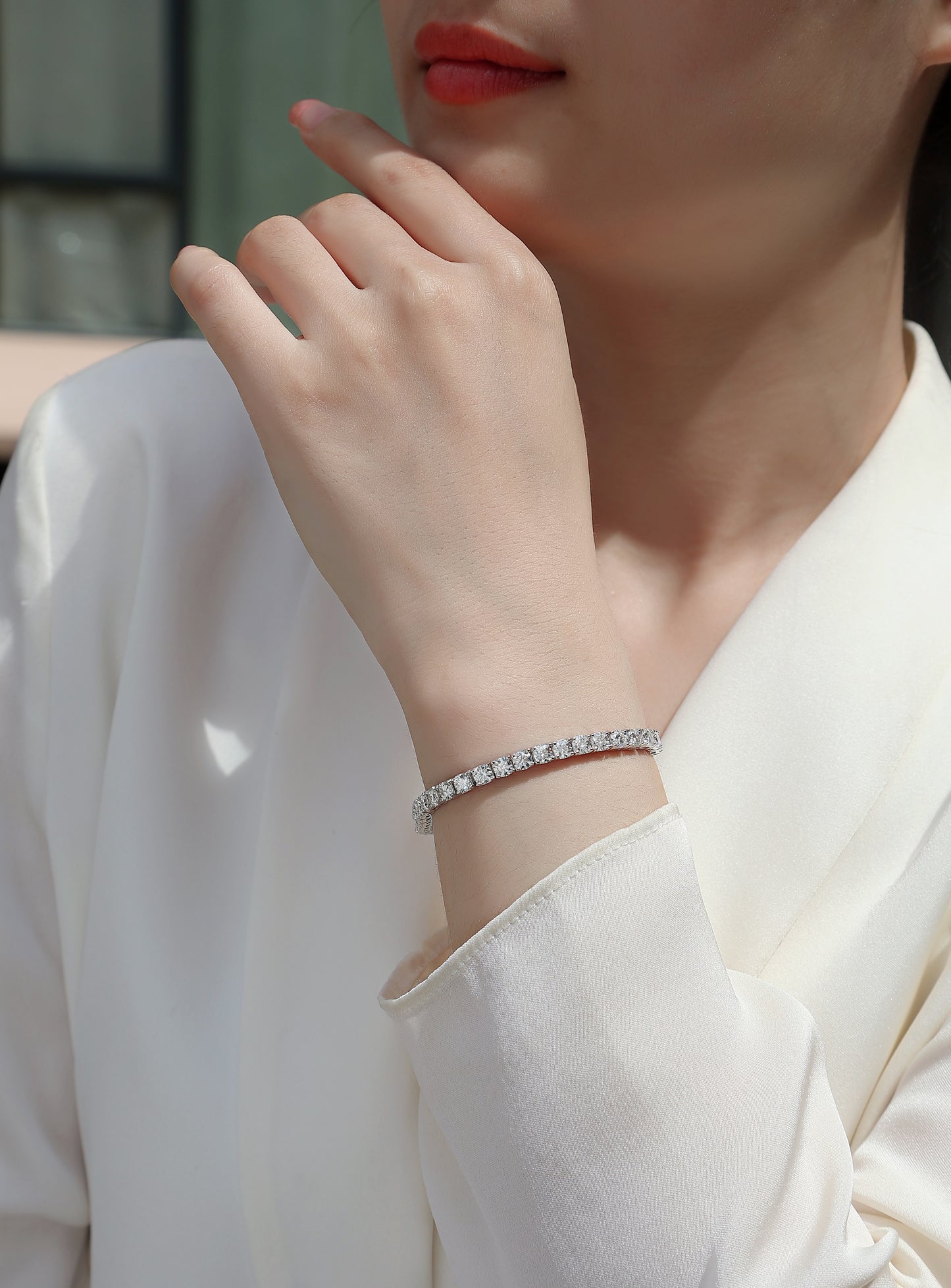 Luìsa Classique Tennis Bracelet  .5 carat Moissanite display prism and pearl on wrist