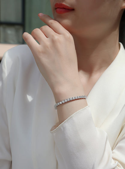 Luìsa Classique Tennis Bracelet  .5 carat Moissanite display prism and pearl on wrist