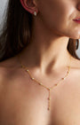 Lumiere Bezel Y Necklace in gold, worn