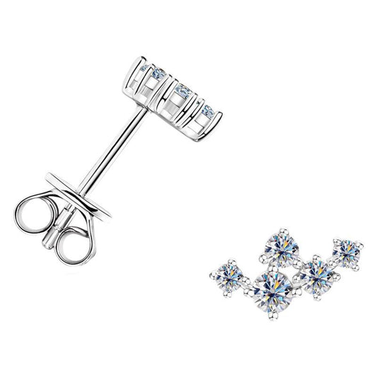 Silver earrings with moissanites on a white background
