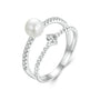 Double band pearl and moissanite pavé ring in sterling silver.