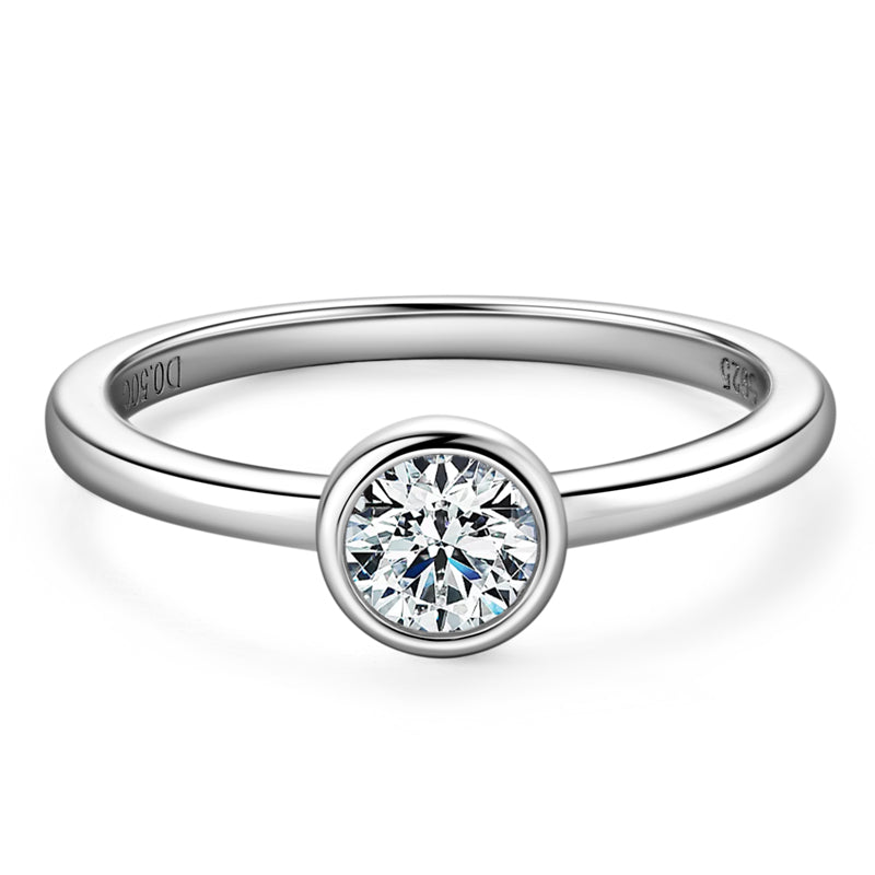 Silver ring with a diamond on a white background