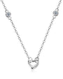 Mila Linked heart pendant with bezel set moissanite accents in sterling silver