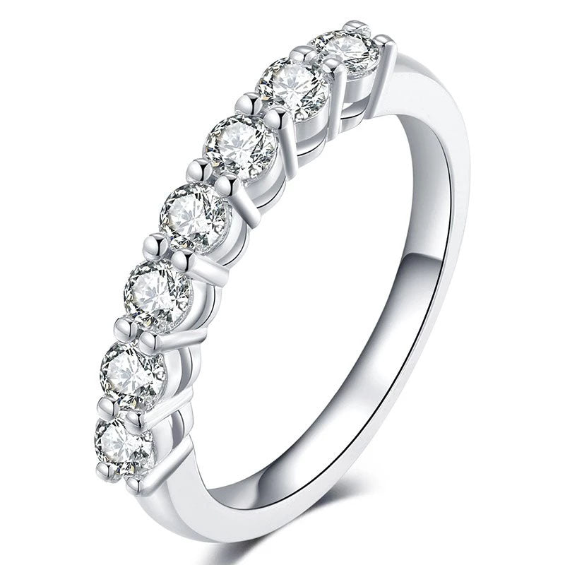 Single row pave moissanite band in sterling silver.