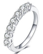 Single row pave moissanite band in sterling silver.