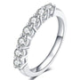 Single row pave moissanite band in sterling silver.