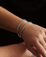 Luisa moissanite tennis bracelets in 3mm and 4mm stacked on the wrist, Prism & Pearl