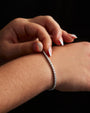 Mini Luisa Slider moissanite tennis bracelet worn on the wrist, Prism & Pearl