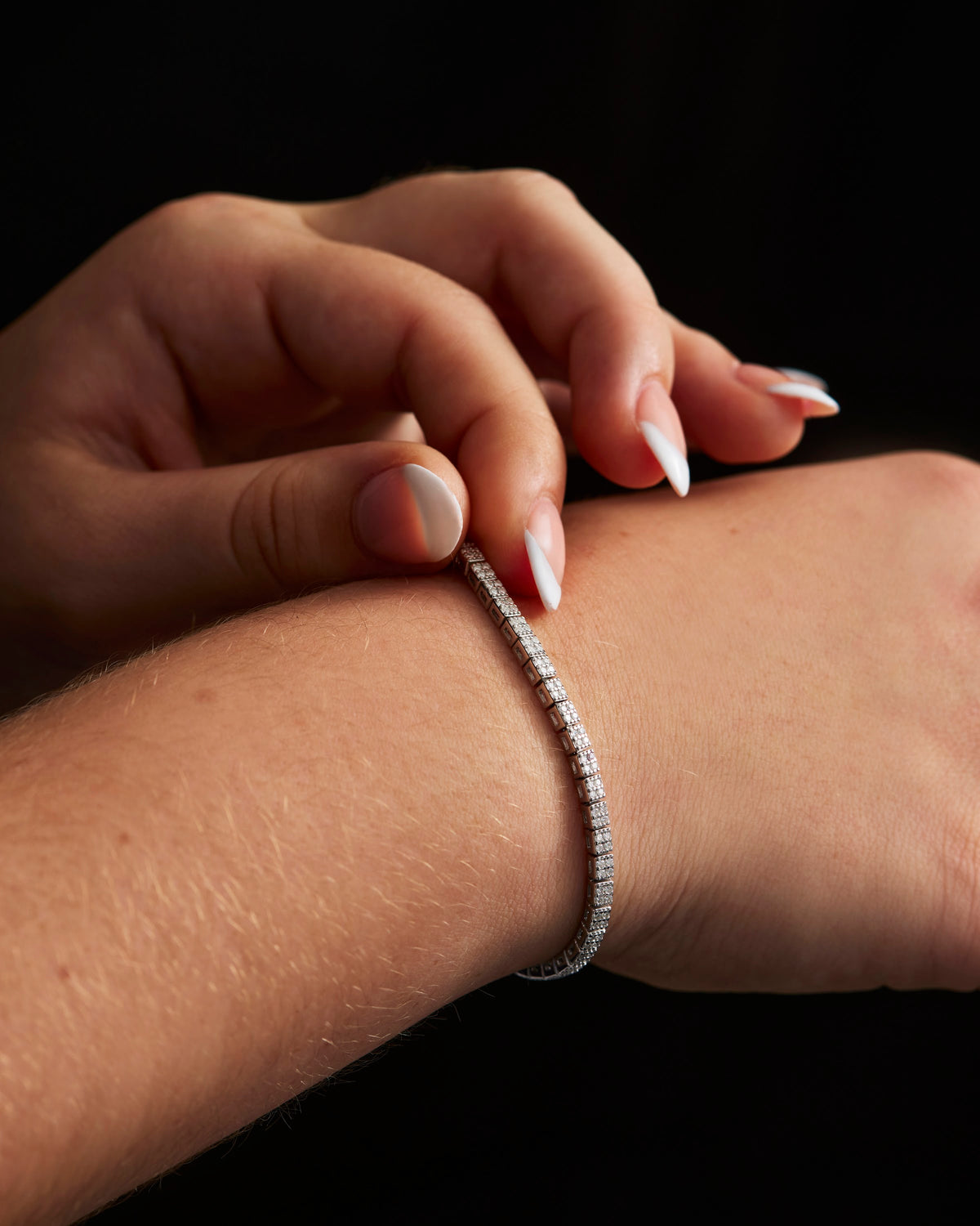 Mini Luisa Slider moissanite tennis bracelet worn on the wrist, Prism & Pearl