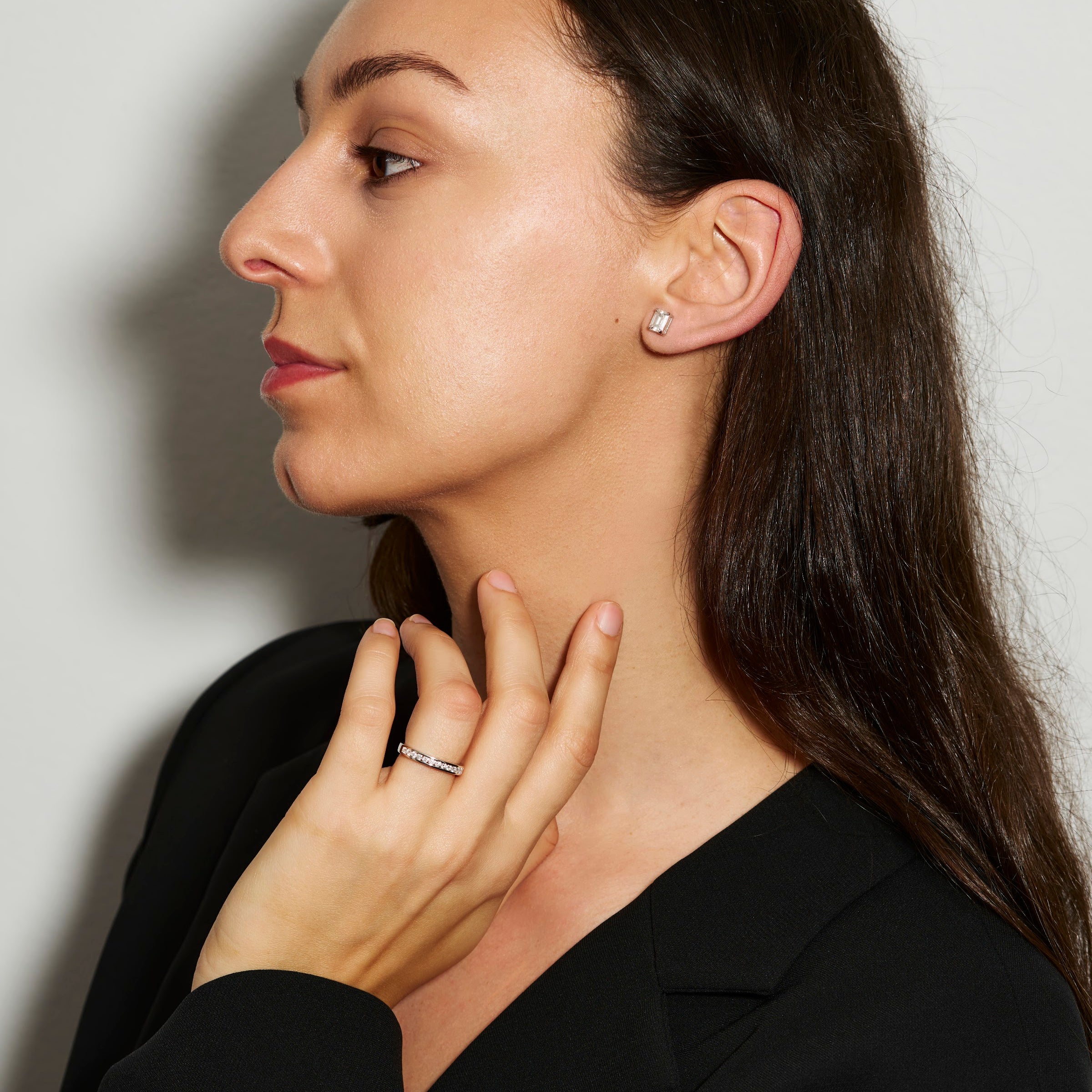 Stephanie moissanite baguette studs worn, styled with a channel set ring, Prism & Pearl