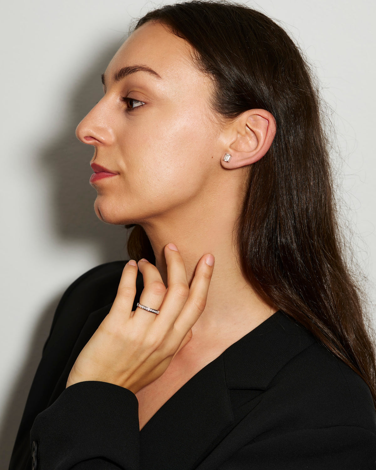 Stephanie moissanite baguette studs worn, styled with a channel set ring, Prism & Pearl