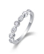 Circle and oval bezel set moissanite stacker ring in sterling silver.