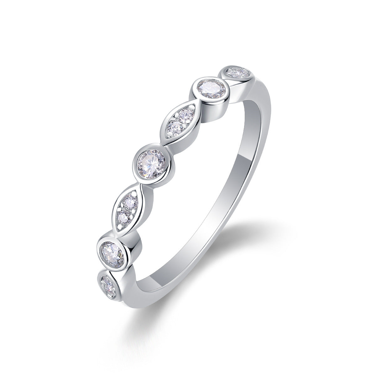 Circle and oval bezel set moissanite stacker ring in sterling silver.
