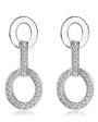 Pair of silver earrings with circular design and clear stones on a white background