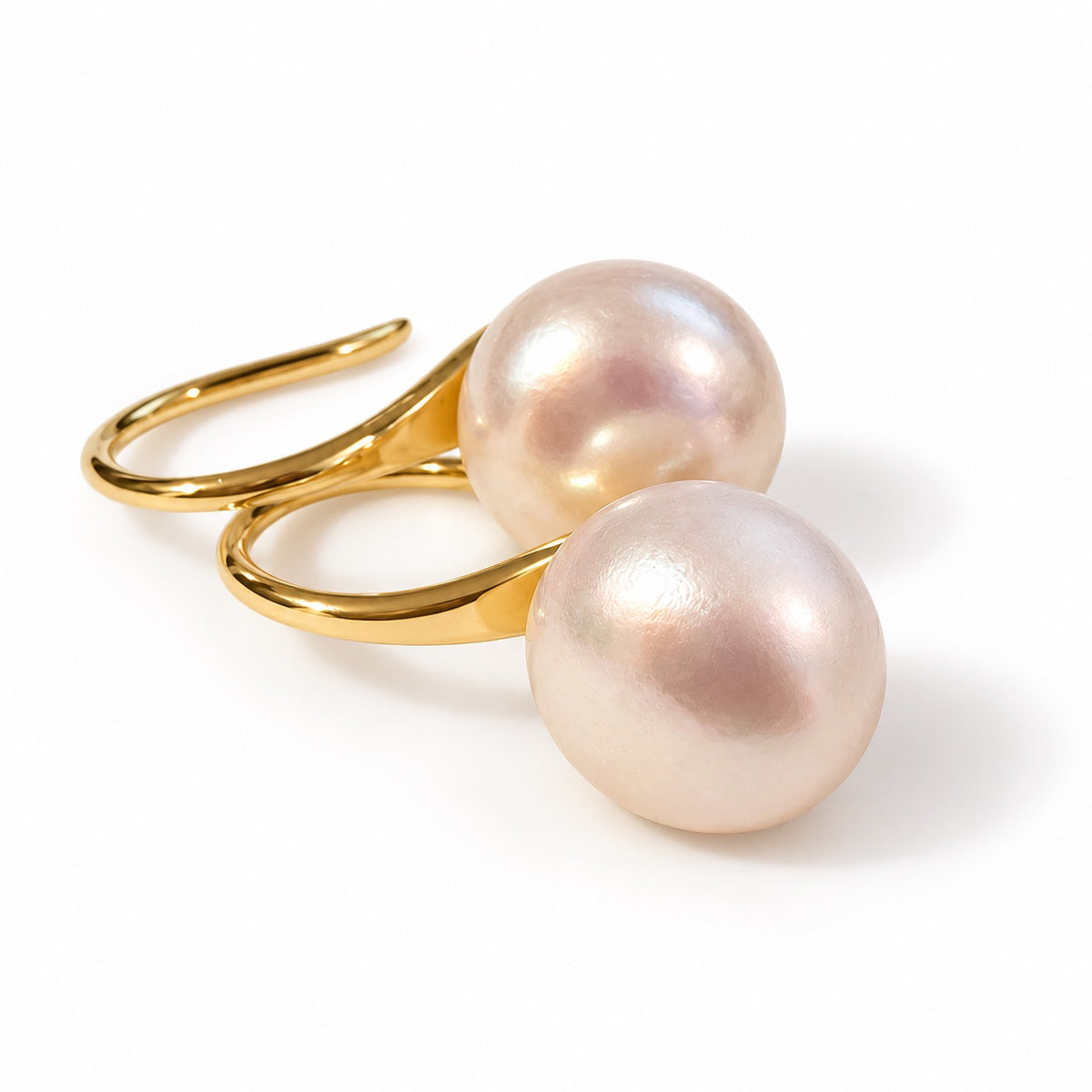 Eloise Pearl Drop Earrings in gold, angled view